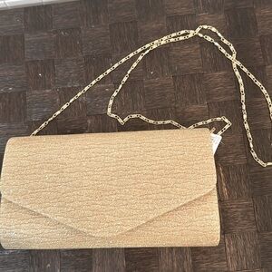 Kendall & James shimmering gold fabric clutch with gold shoulder chain. NWT.